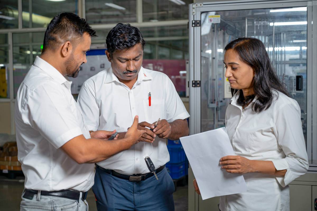 Employees of Huf India during quality control at the factory in Pune.